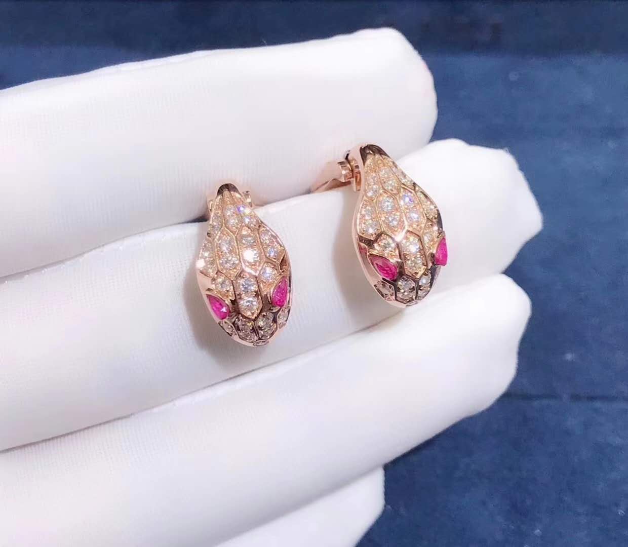 Bvlgari Serpenti Earrings in 18k rose gold set with rubellite eyes and full pave diamonds